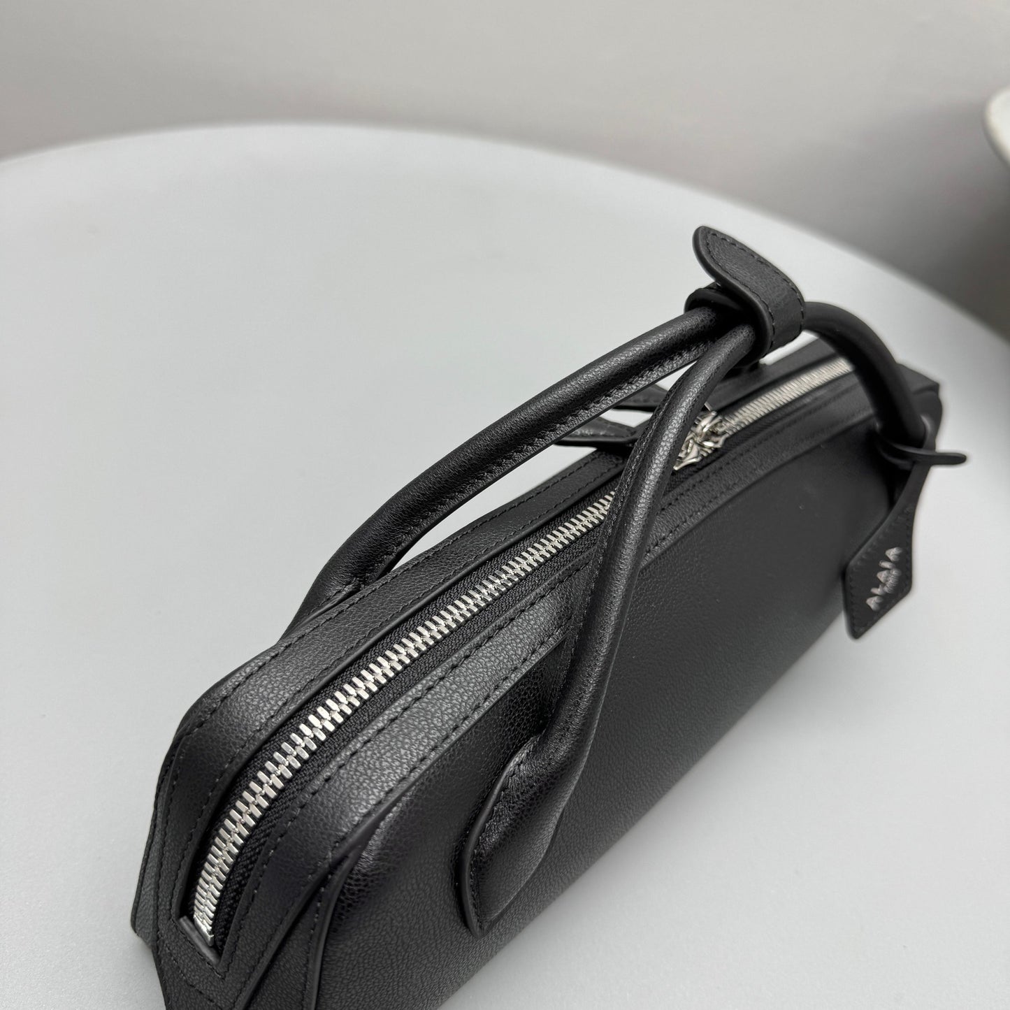 ALAIA LE TECKEL CLUTCH