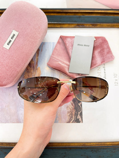 MIU M SUNGLASSES