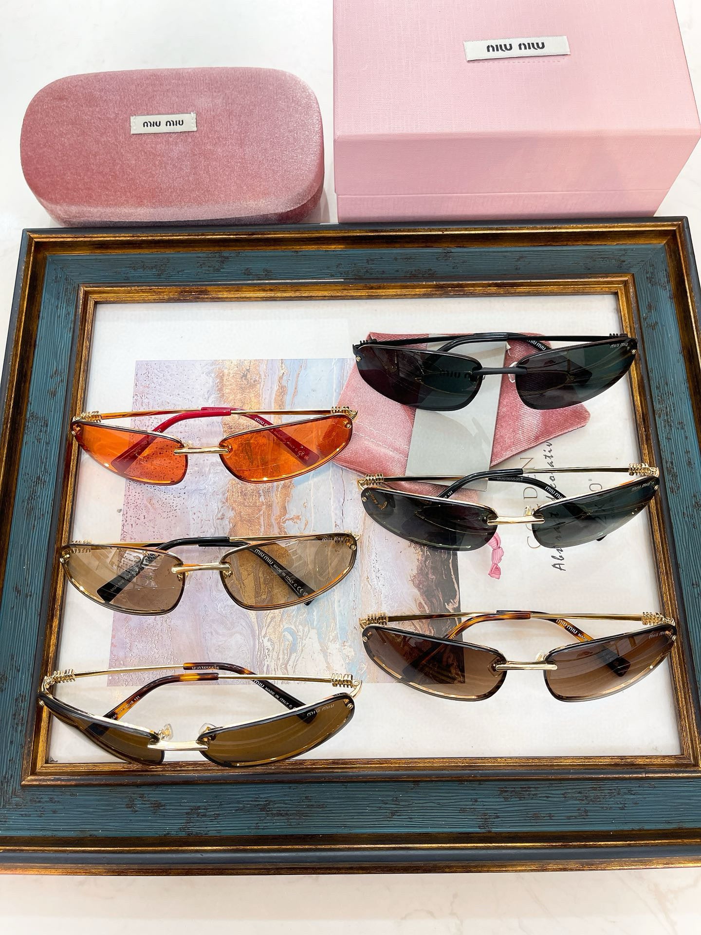 MIU M SUNGLASSES