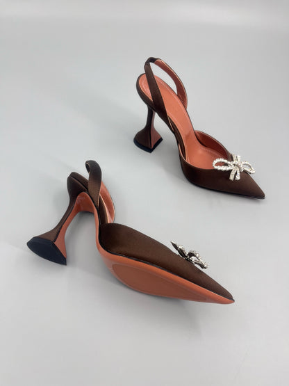 AMINA M HEELS