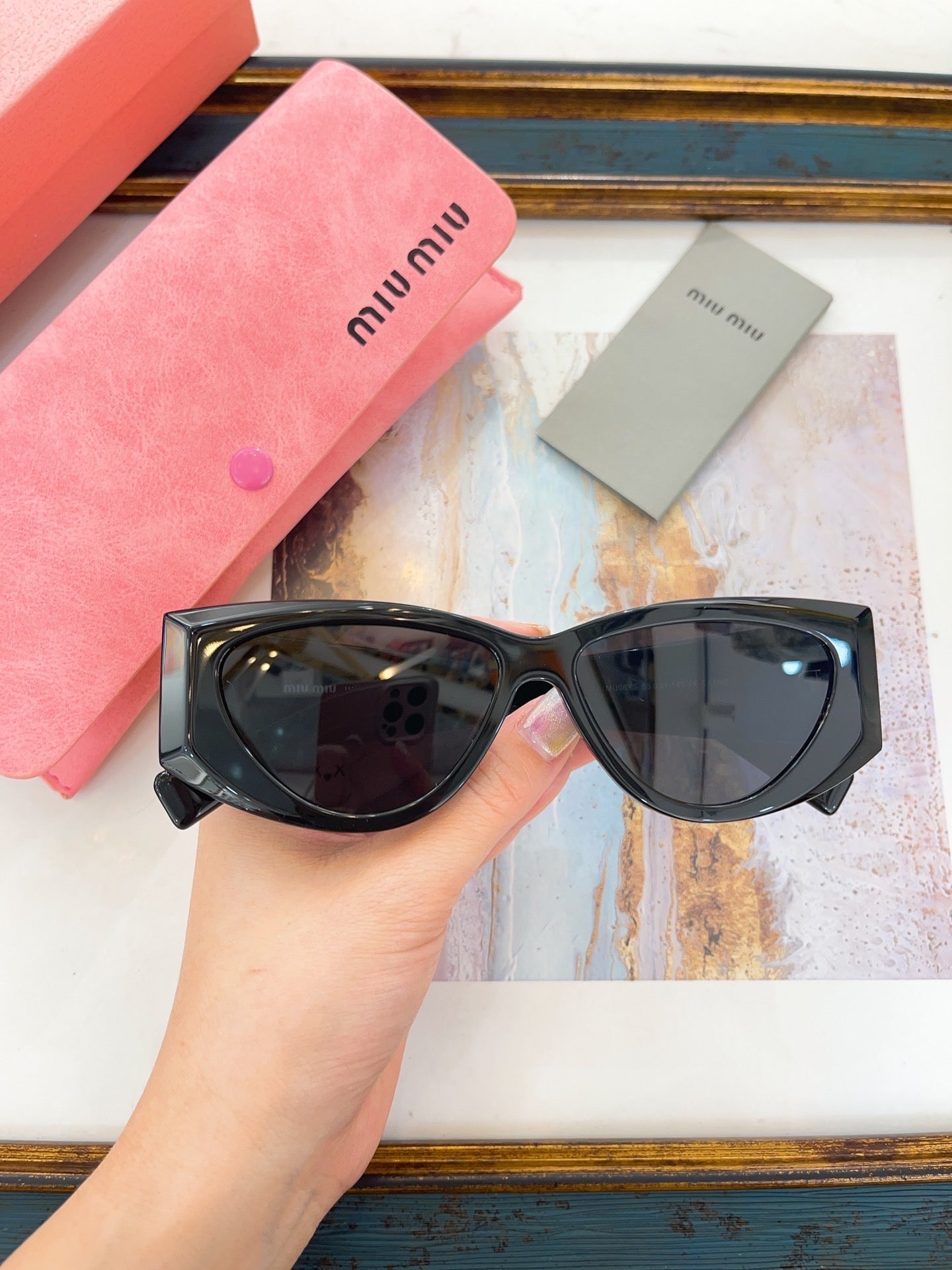 MIU M SUNGLASSES