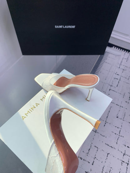 AMINA M HEELS