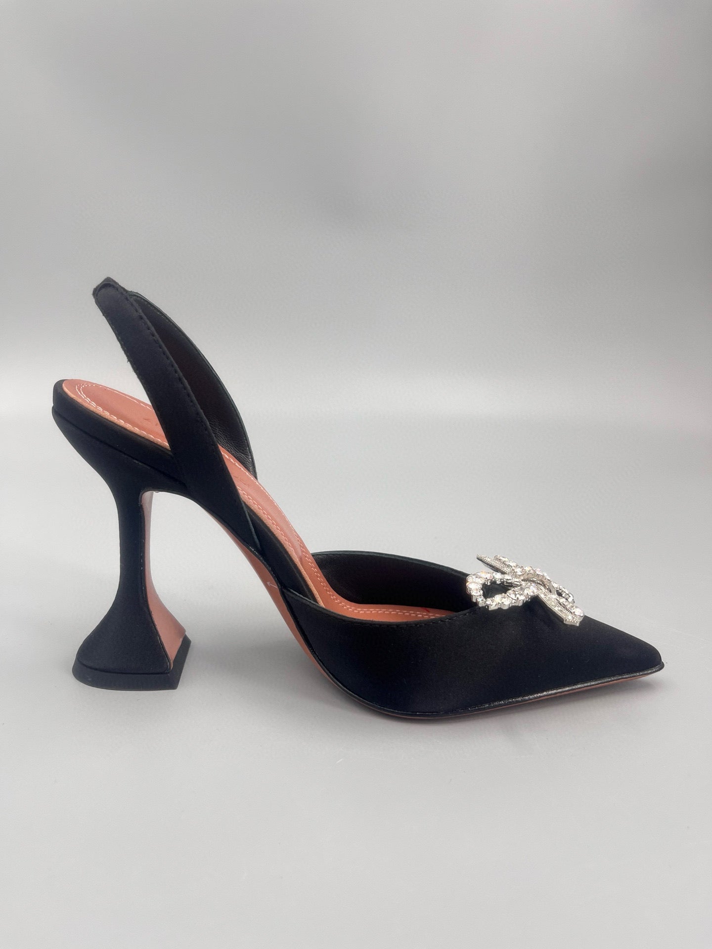 AMINA M HEELS