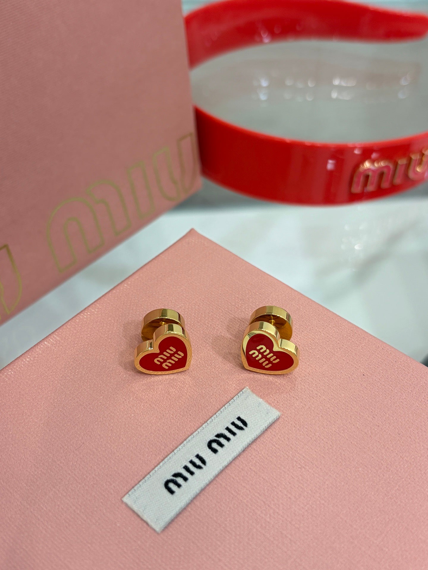 MIU M EARRINGS