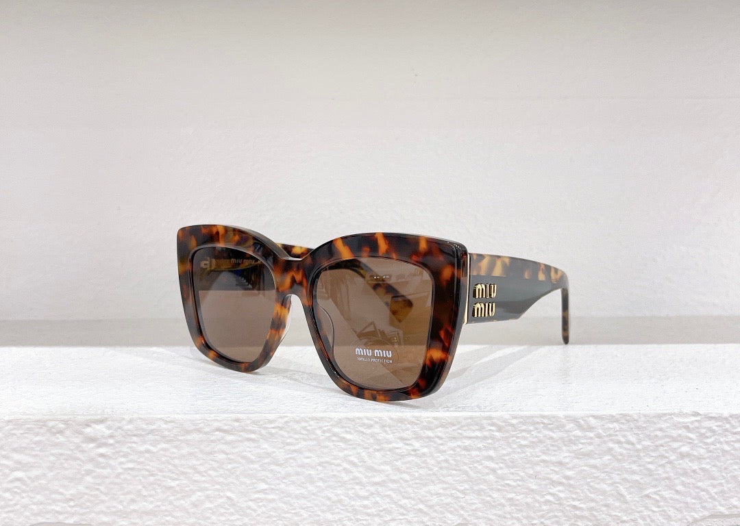 MIU M SUNGLASSES