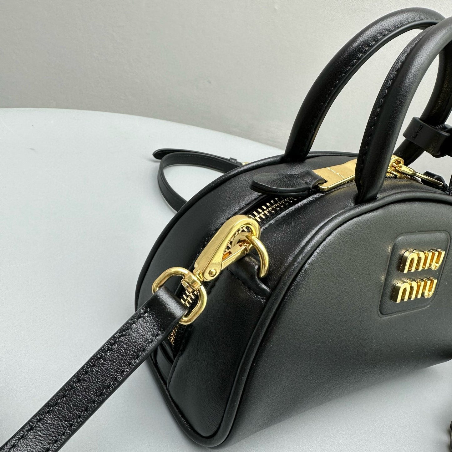 MIU M LEATHER TOP HANDLE BAG