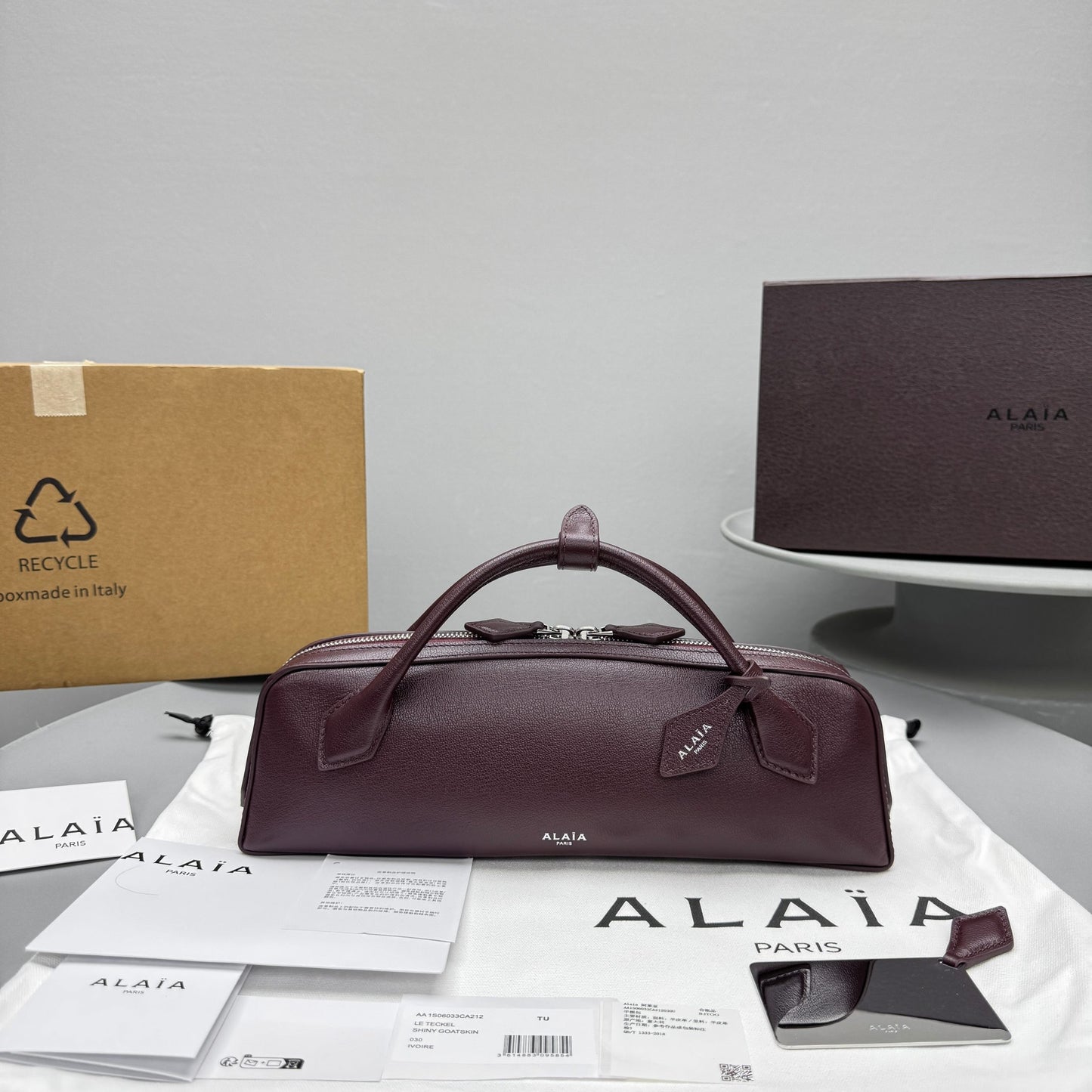 ALAIA LE TECKEL CLUTCH