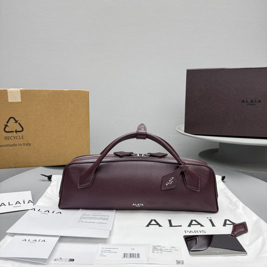 ALAIA LE TECKEL CLUTCH