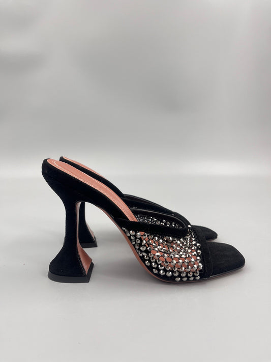 AMINA M HEELS