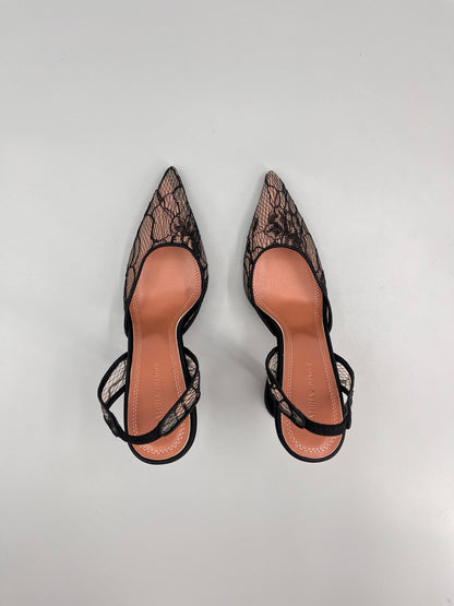 AMINA M HEELS