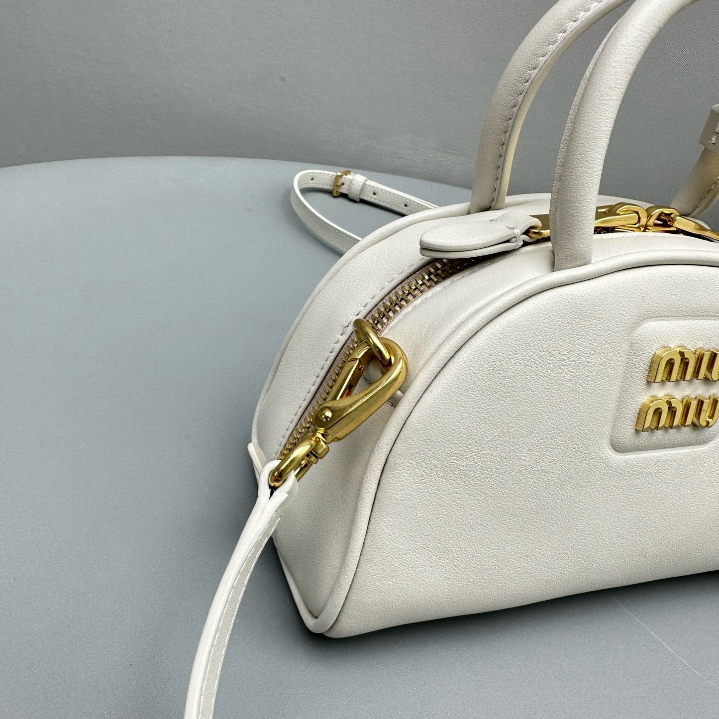 MIU M LEATHER TOP HANDLE BAG