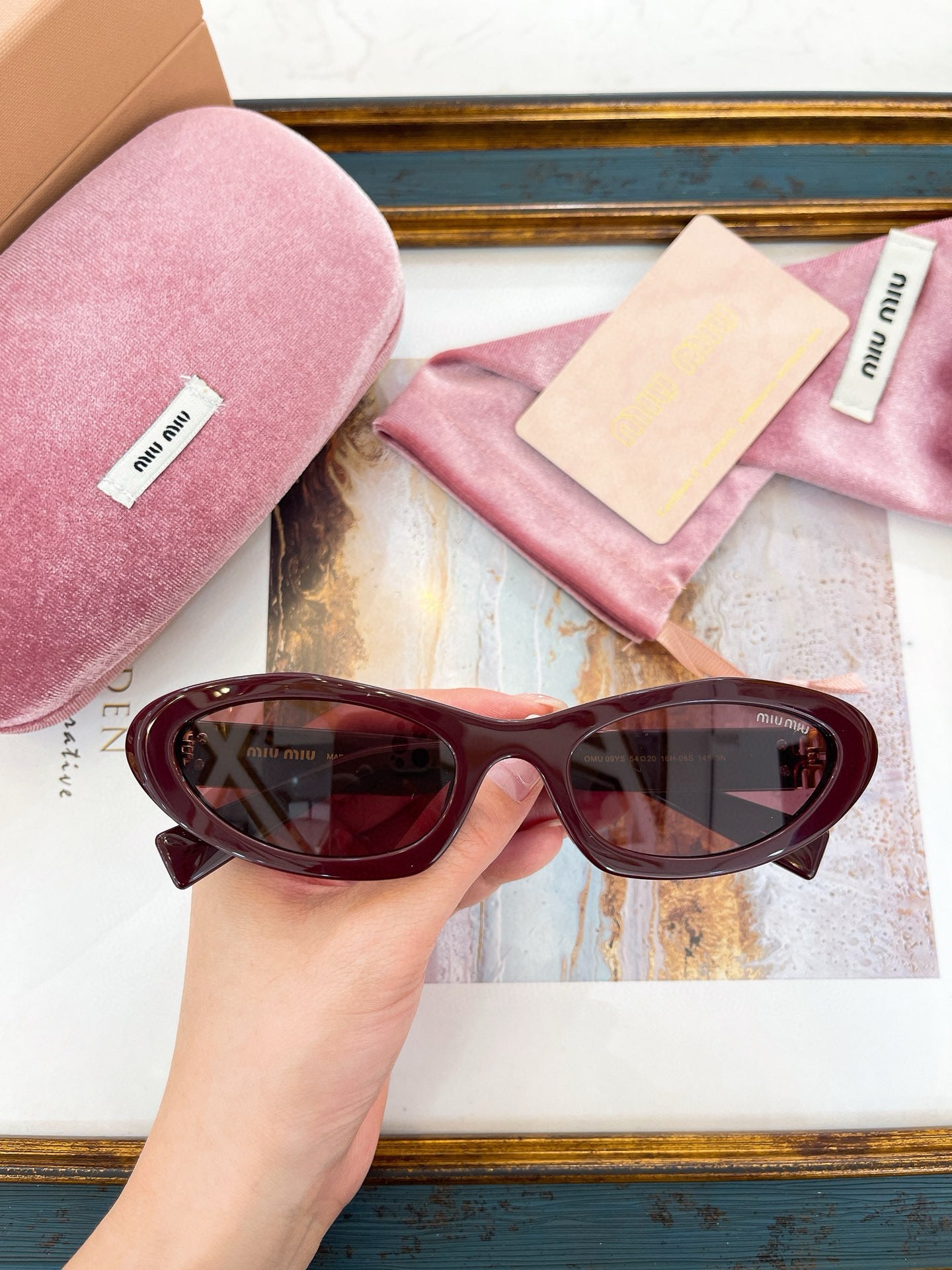 MIU M SUNGLASSES