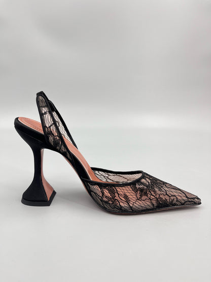 AMINA M HEELS