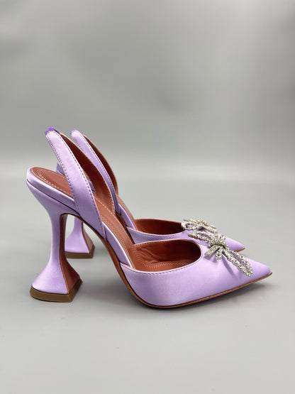 AMINA M HEELS