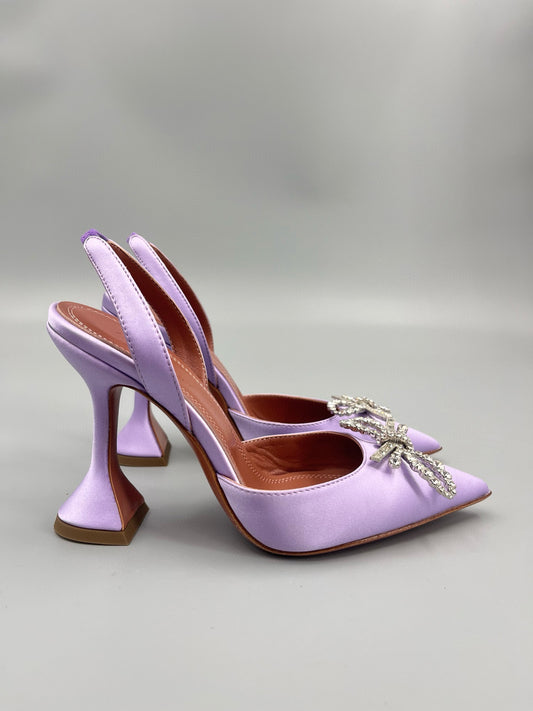 AMINA M HEELS