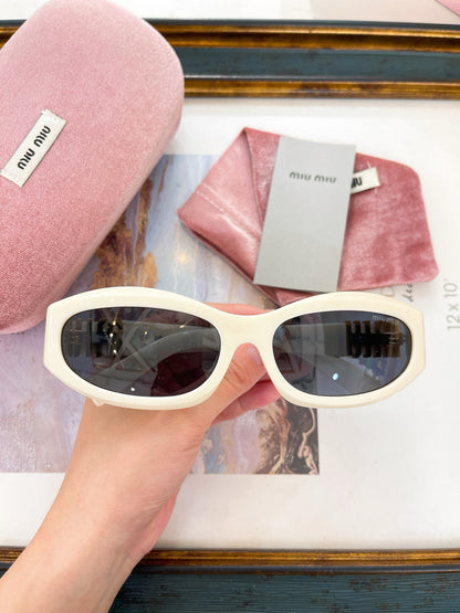 MIU M SUNGLASSES