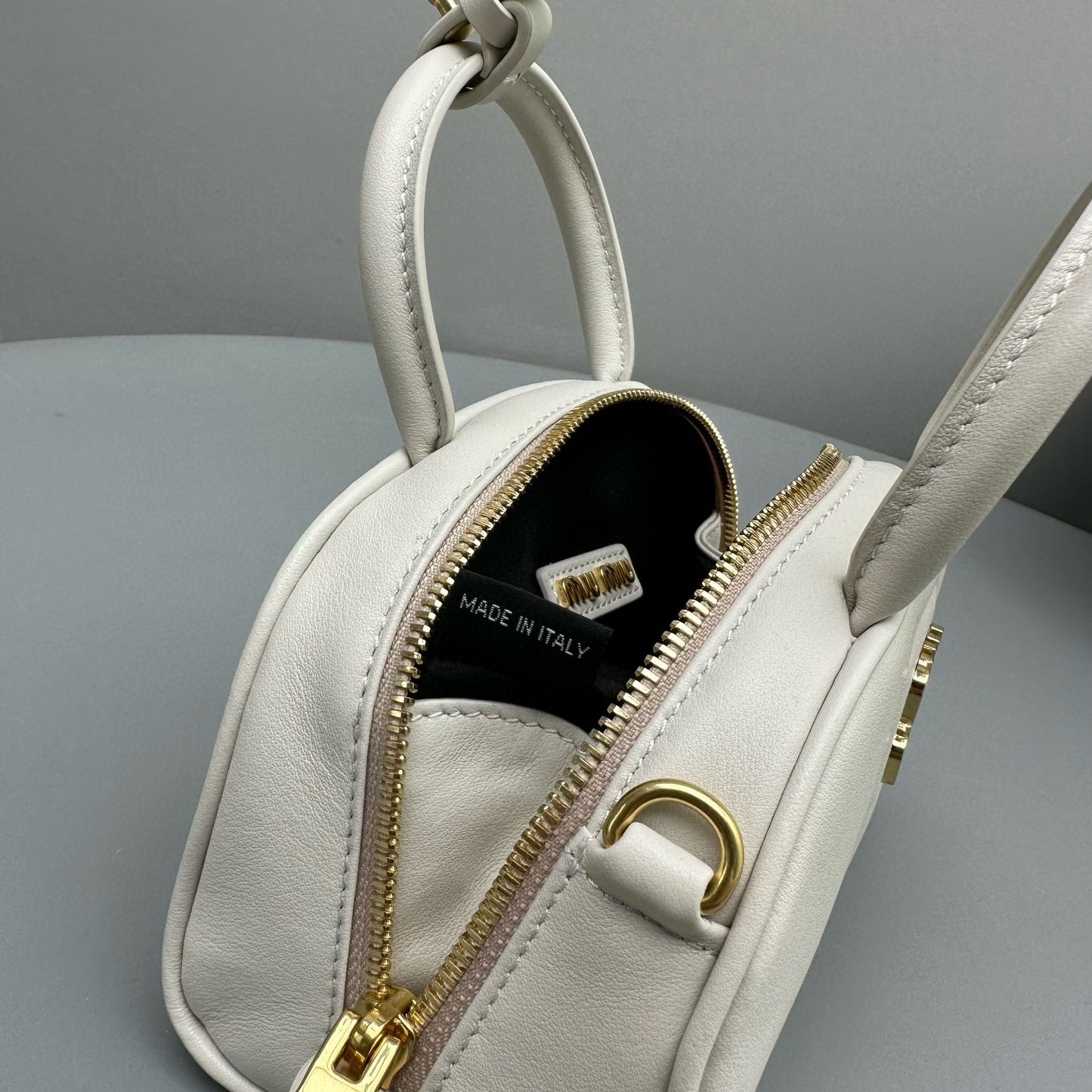 MIU M LEATHER TOP HANDLE BAG