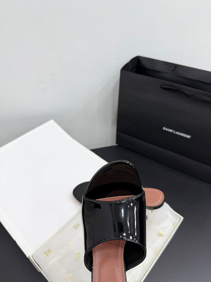 AMINA M HEELS