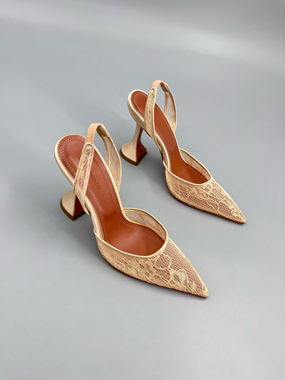 AMINA M HEELS
