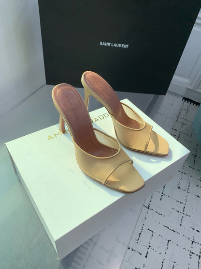 AMINA M HEELS