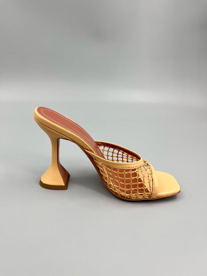 AMINA M HEELS