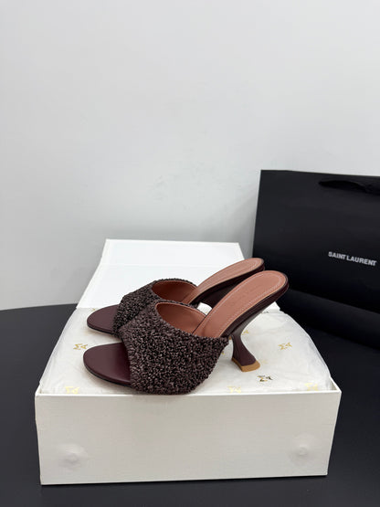 AMINA M HEELS