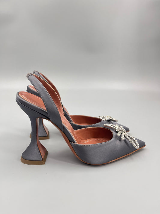 AMINA M HEELS