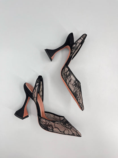 AMINA M HEELS