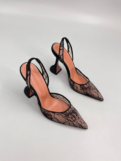 AMINA M HEELS