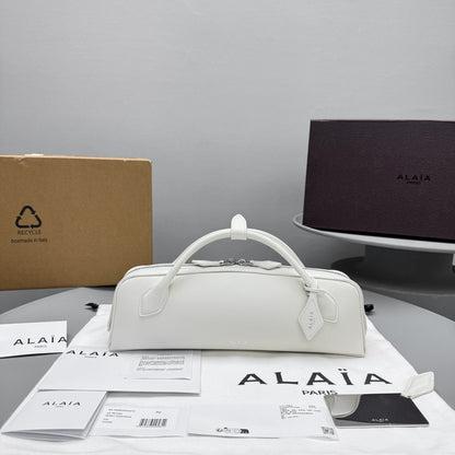 ALAIA LE TECKEL CLUTCH
