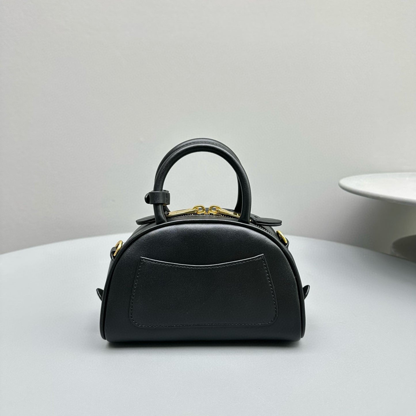 MIU M LEATHER TOP HANDLE BAG