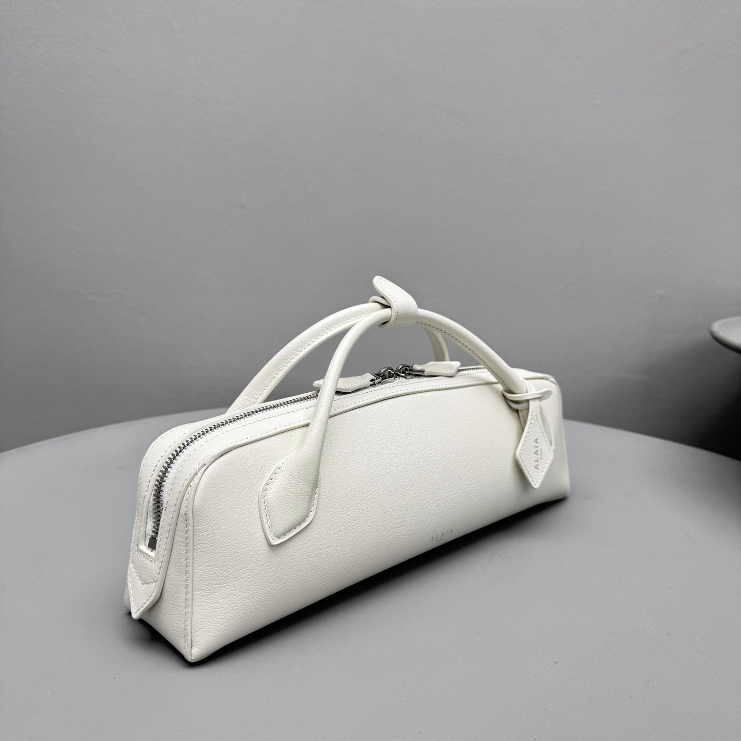 ALAIA LE TECKEL CLUTCH