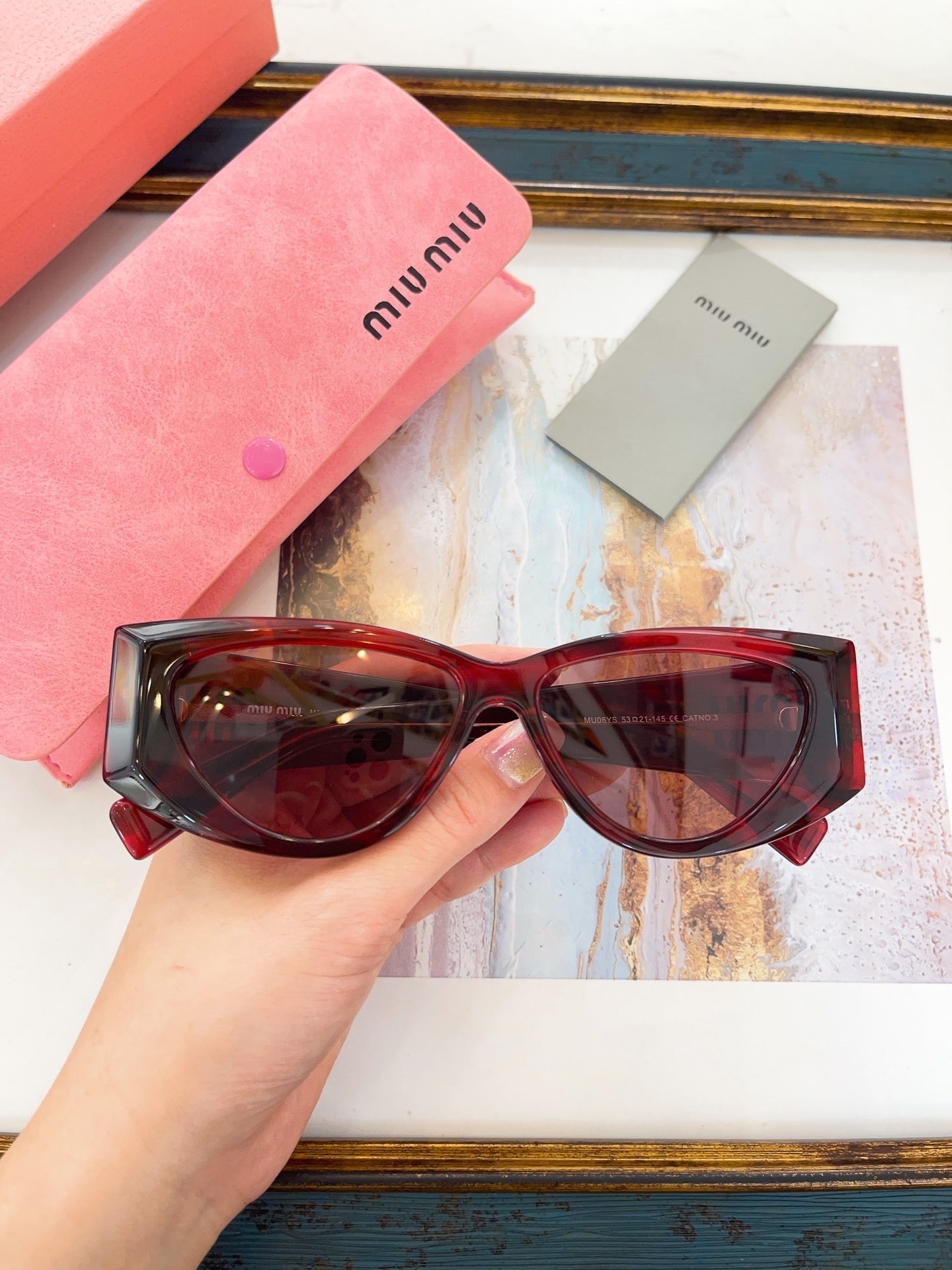 MIU M SUNGLASSES