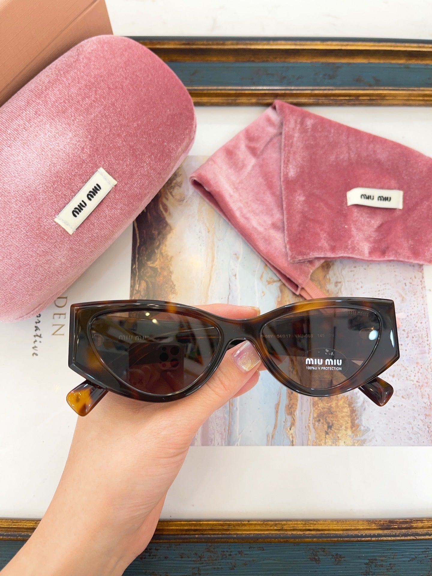 MIU M SUNGLASSES