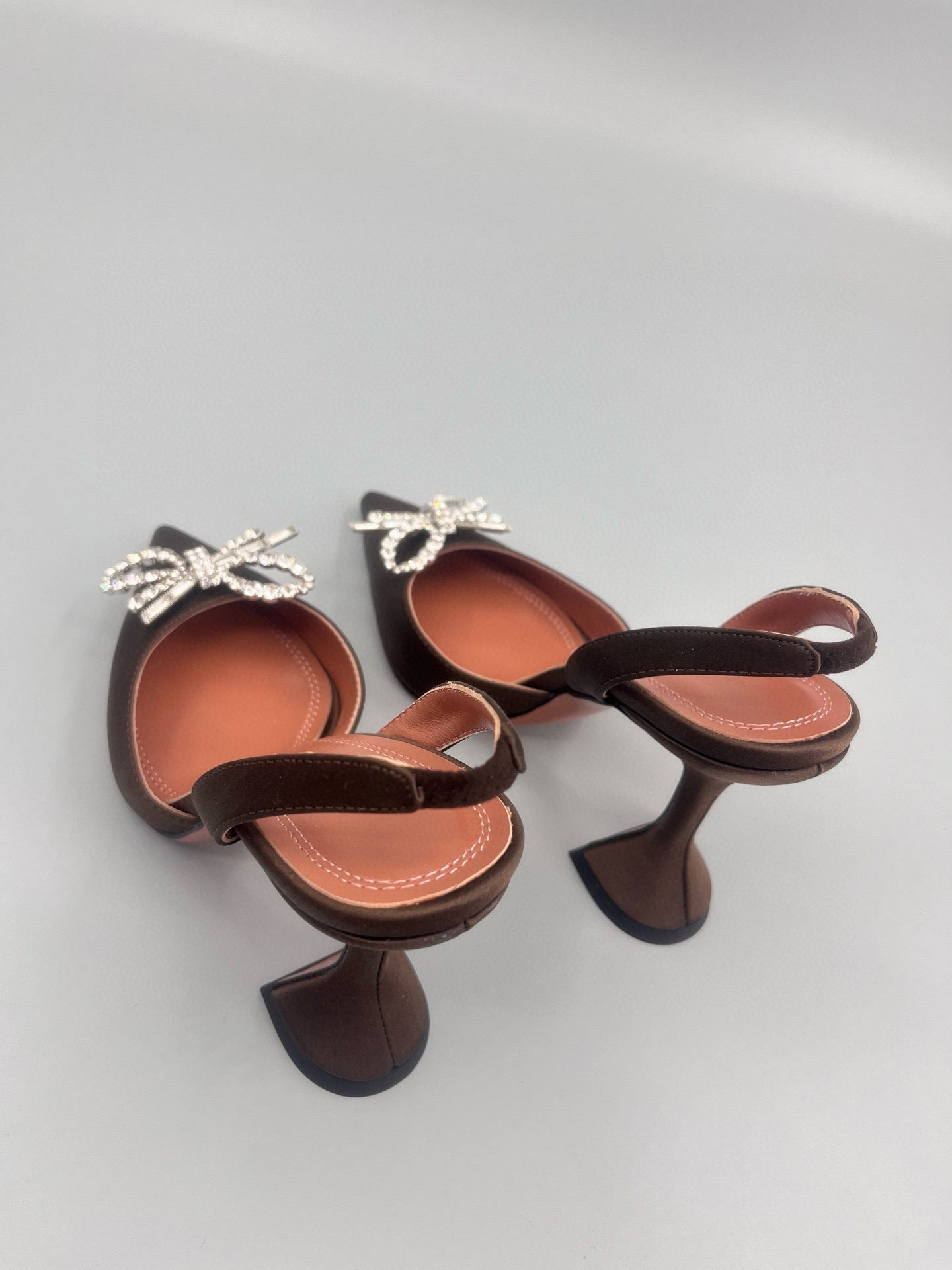 AMINA M HEELS