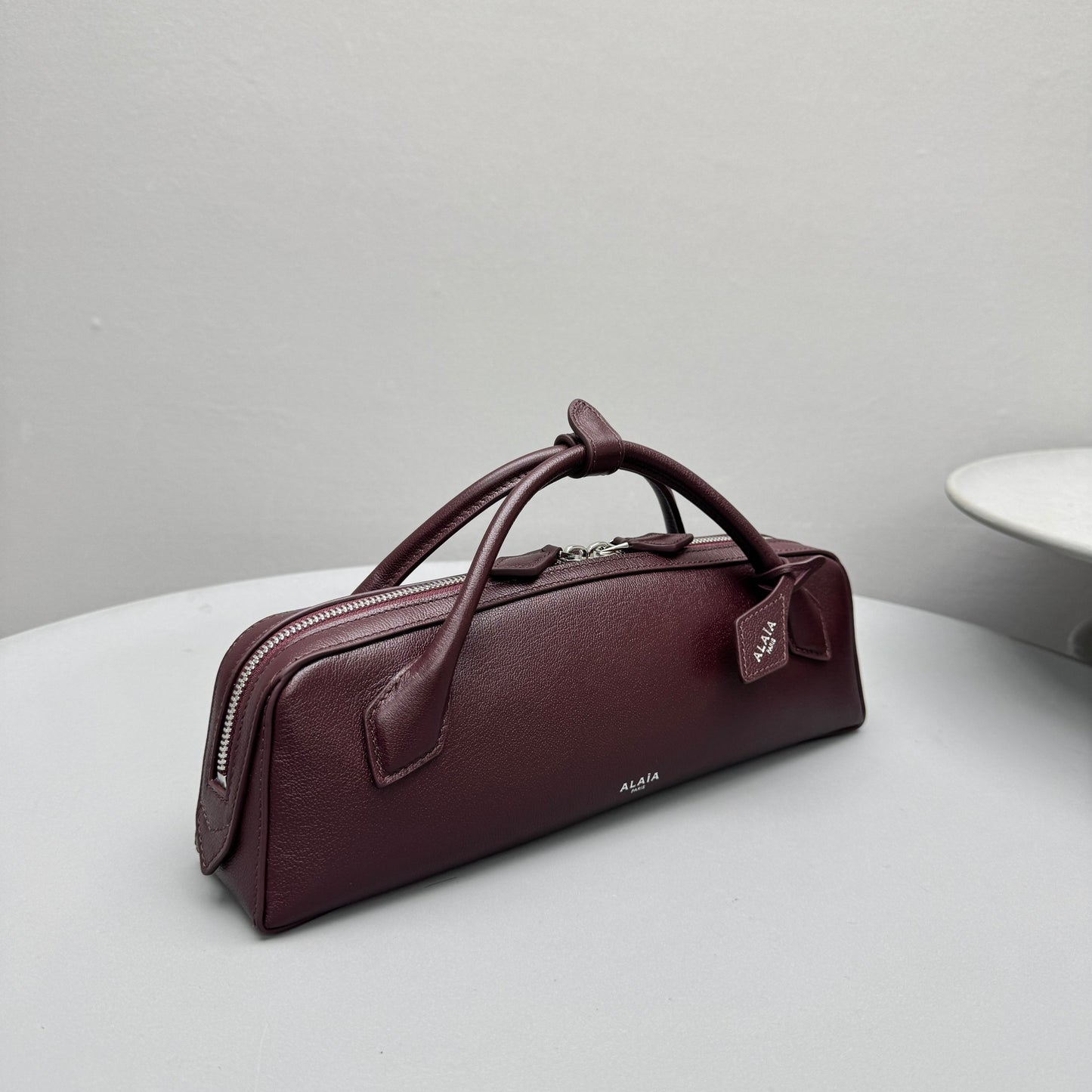 ALAIA LE TECKEL CLUTCH