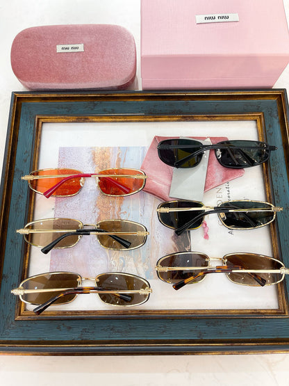 MIU M SUNGLASSES