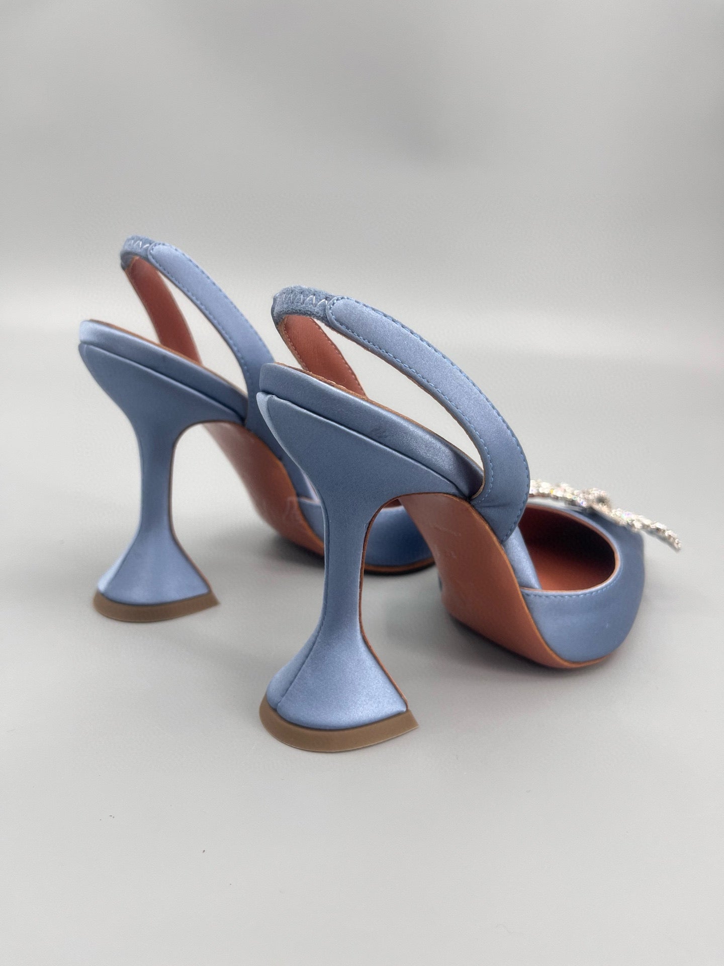 AMINA M HEELS