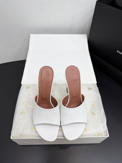 AMINA M HEELS