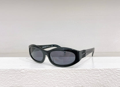 MIU M SUNGLASSES