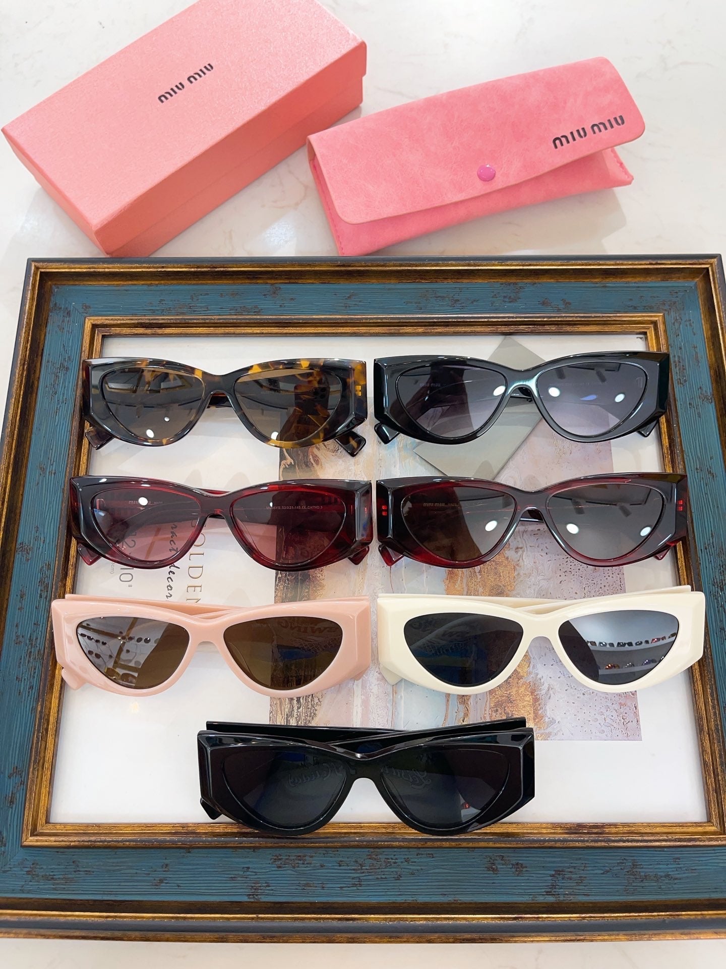 MIU M SUNGLASSES