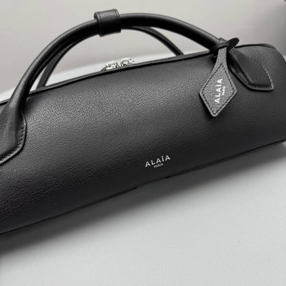 ALAIA LE TECKEL CLUTCH