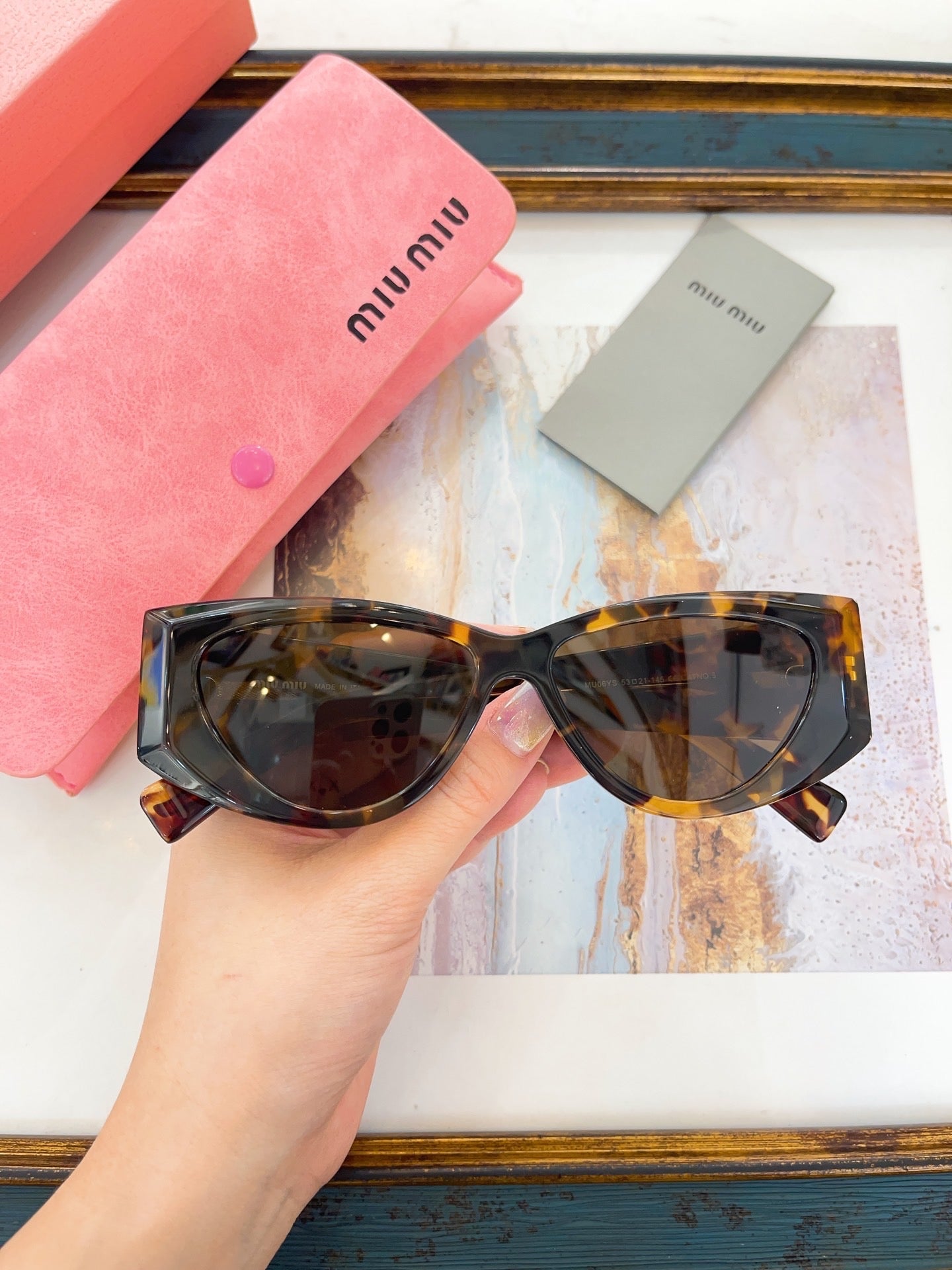 MIU M SUNGLASSES