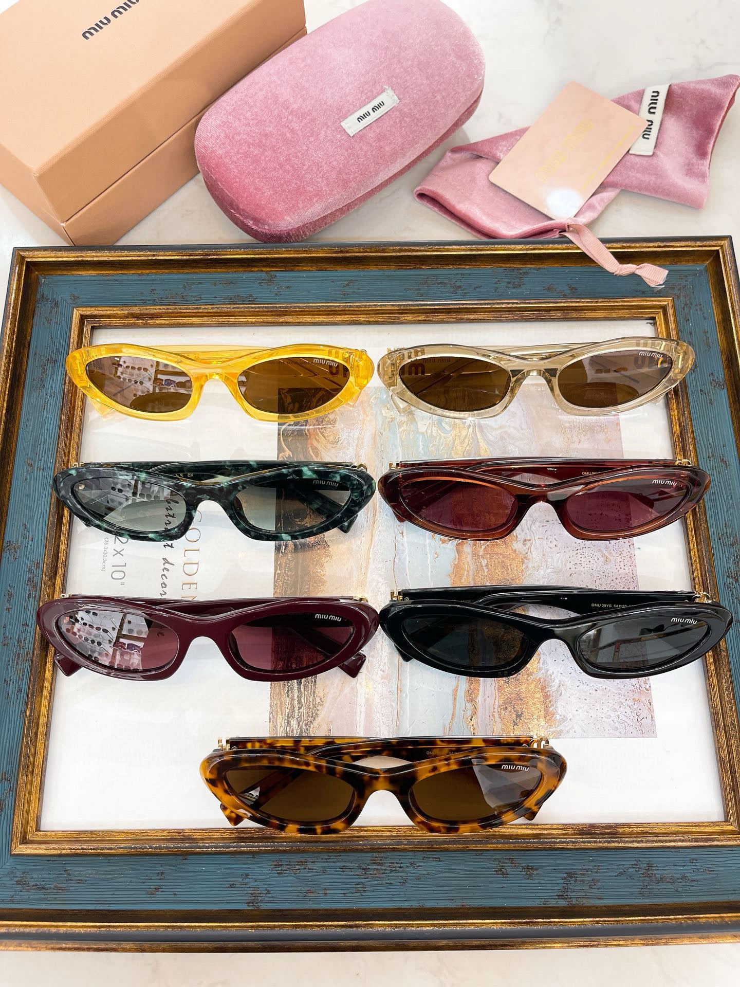 MIU M SUNGLASSES