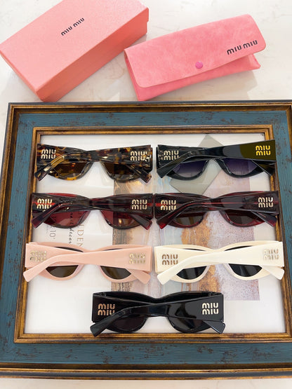 MIU M SUNGLASSES