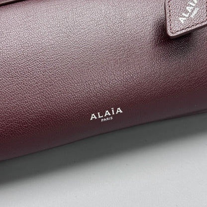 ALAIA LE TECKEL CLUTCH