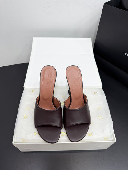 AMINA M HEELS