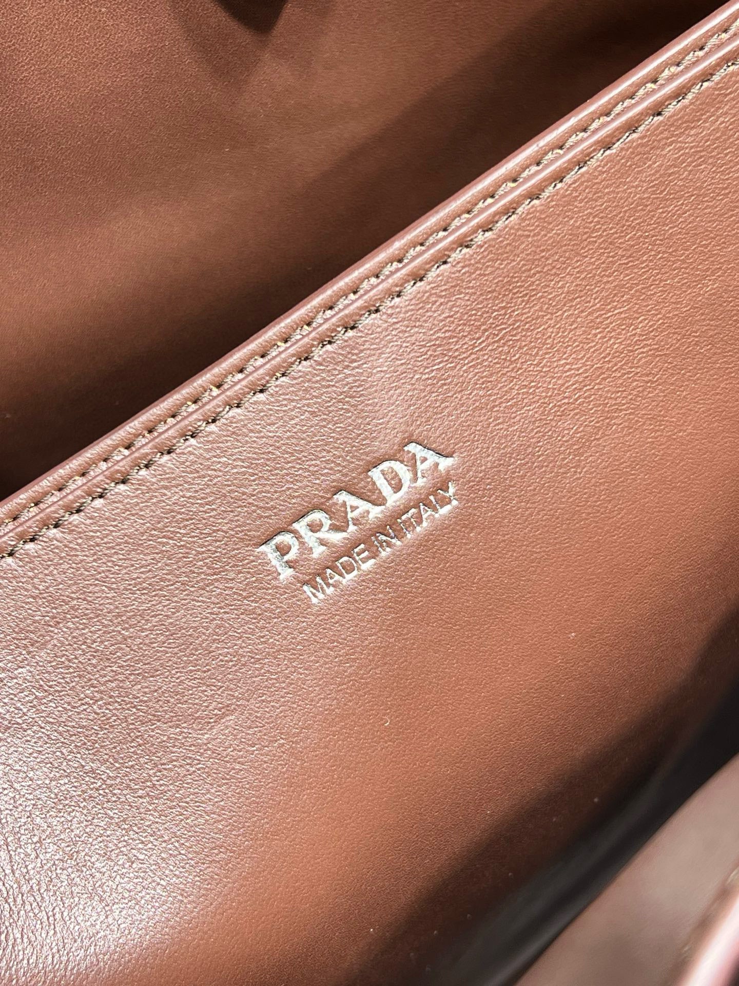 PD BUCKLE NAPPA LEATHER BAG