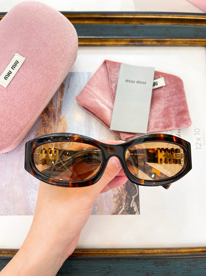 MIU M SUNGLASSES