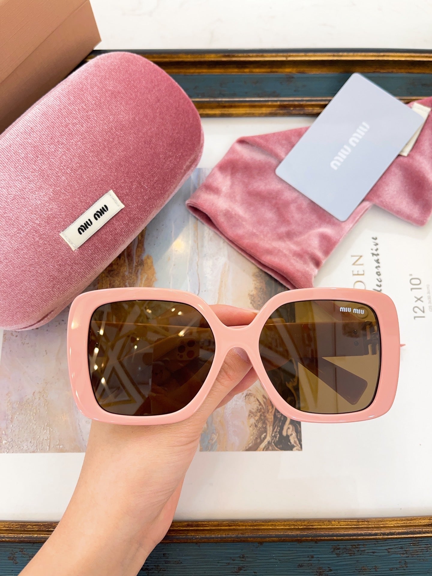 MIU M SUNGLASSES